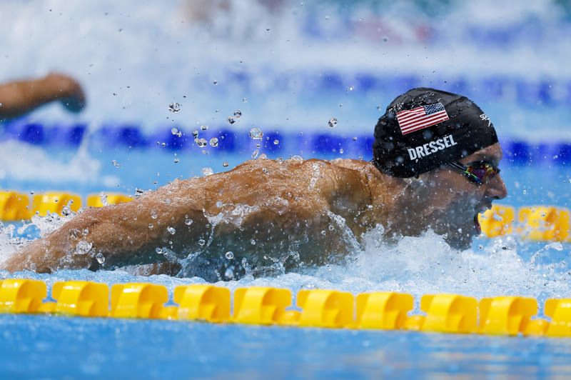 Caeleb Dressel of the United States of America (USA) on his way winning in the men's 100m Butterfly Final during the Swimming events of the Tokyo 2020 Olympic Games at the Tokyo Aquatics Centre in Tokyo, Japan, 31 July 2021.