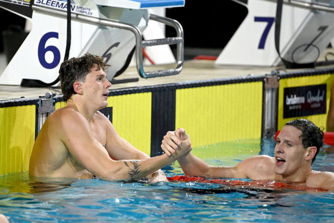 Change of Guard: Isaac Cooper, left, congratulated by former Aussie No 1 Mitch Larkin, World champion and Olympic silver medallist at the peak of his career - by Delly Carr, courtesy of Swimming Australia   