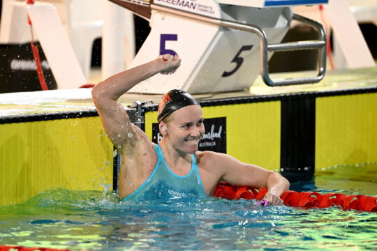 Ariarne Titmus celebrates her 200m freestyle World record in Brisbane, photo by Delly Carr, courtesy of Swimming Australia